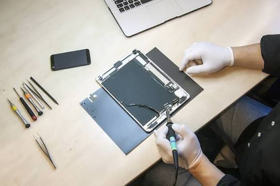 Tablet Button Repair Gorey